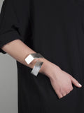 Wait here.  Help is on the way.  wide silver cuff